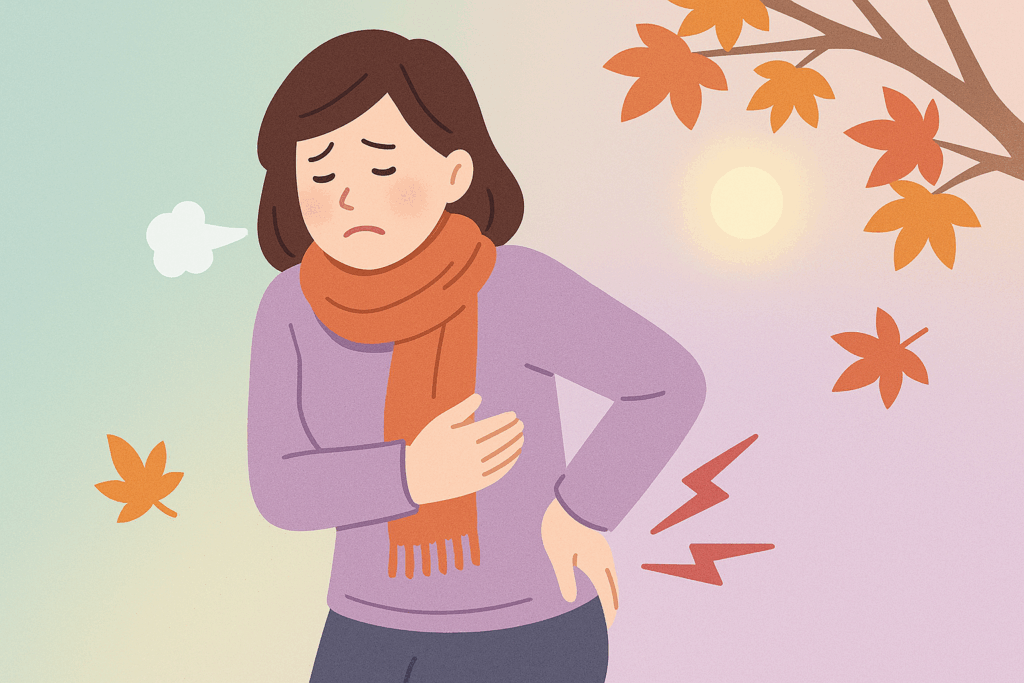 秋冬の寒暖差でギックリ腰に悩む女性イラスト｜岡山市たい整骨院